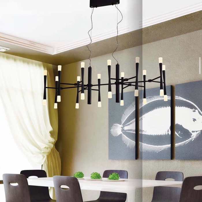 Black multi-arm sputnik-style chandelier over a dining table